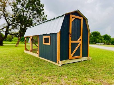 Graystone & Cedar: Built to be the centerpiece. Gray body, cedar trim, fully automated.