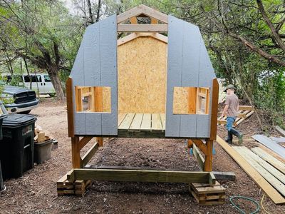 Henhouse taking shape: Walls and floor in, before the doors and roof.