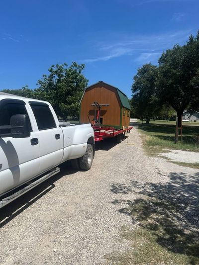 Sheds too: A barn shed on its way down a country road.